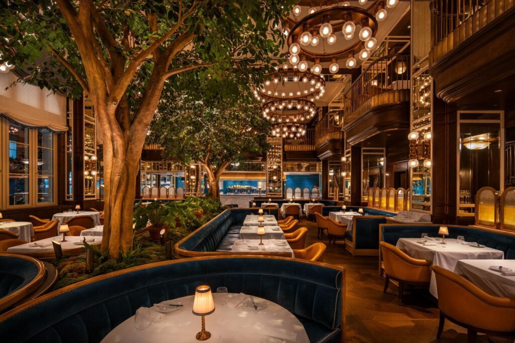 white sofa against a background of a black wall with molded white lighting